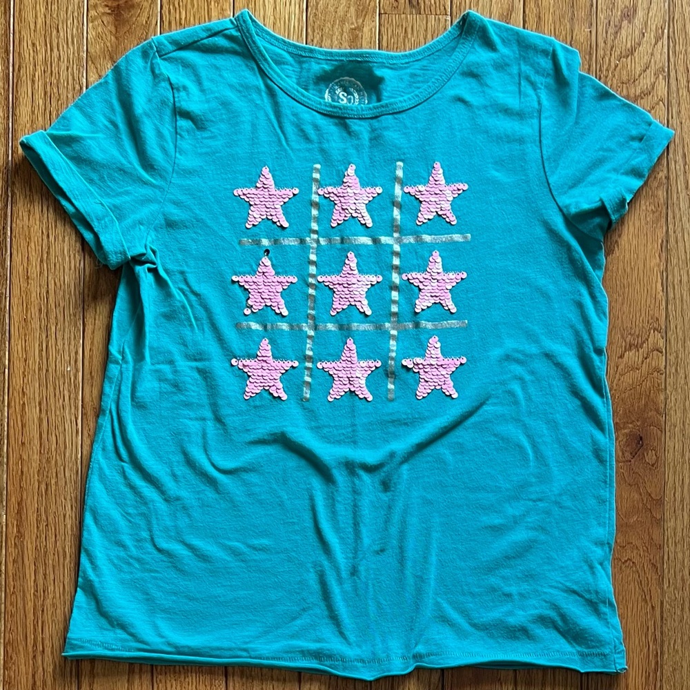 So (Kohl’s) teal tshirt with flip sequins stars like tix-tac-toe Girls size 12